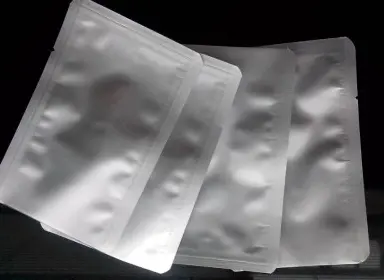 What are the benefits of packaging food in aluminum foil bags?