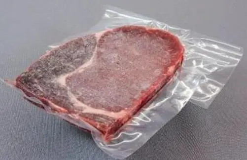 What type of material is commonly used for beef vacuum packaging bags?