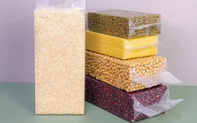 Production process of vacuum rice brick bags