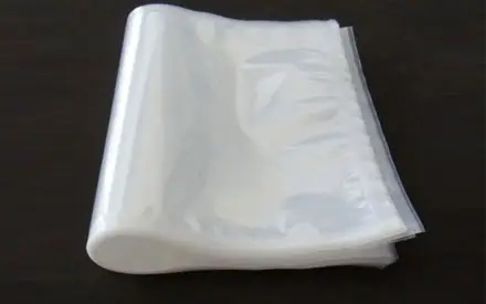 Which is better for customizing PE or PET materials for vacuum packaging bags?