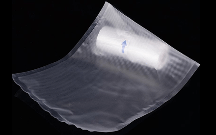 Material of textured vacuum packaging bags