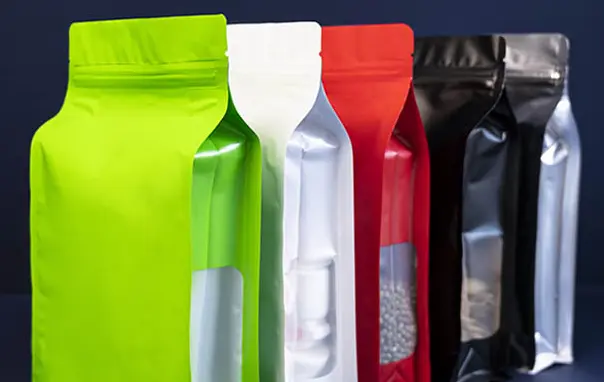 Manufacturing process of colored aluminum plated octagonal sealed bag