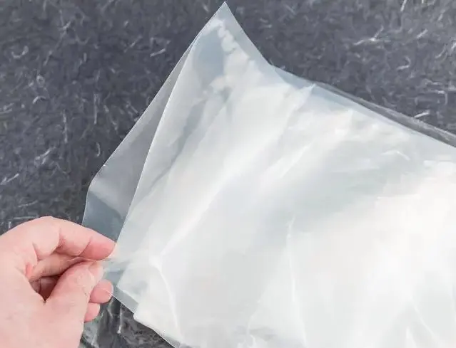 What material is the high-temperature steaming bag made of?
